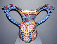 Modelled by Layeki, painted by Zinhle Earthenware with coloured glazes, 2000 20 cm high