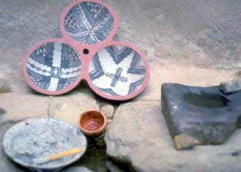 wheel-thrown ware, brightly decorated, glazed and fired in large kilns