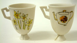 20. Porcelain cup on base with Welsh tea party illustration.2003, H. 7.5cm