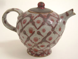 7. Stoneware teapot with pink painted decoration, 1979, H. 12 cm